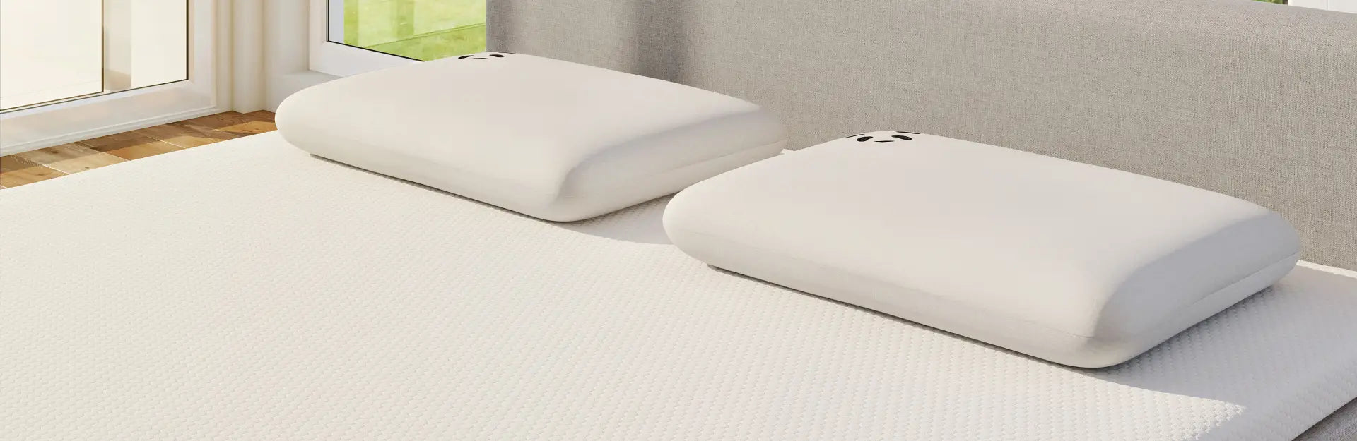 Two plush pillows on a bed, showcasing comfort and style for better sleep quality.