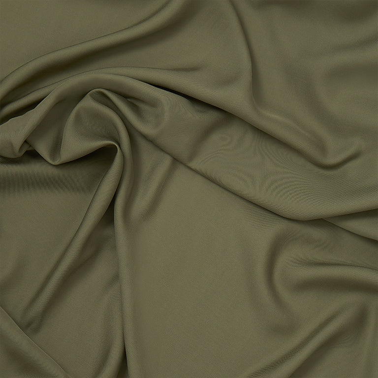 Soft olive green Bamboo Lyocell fabric, perfect for eco-friendly bedding collections.