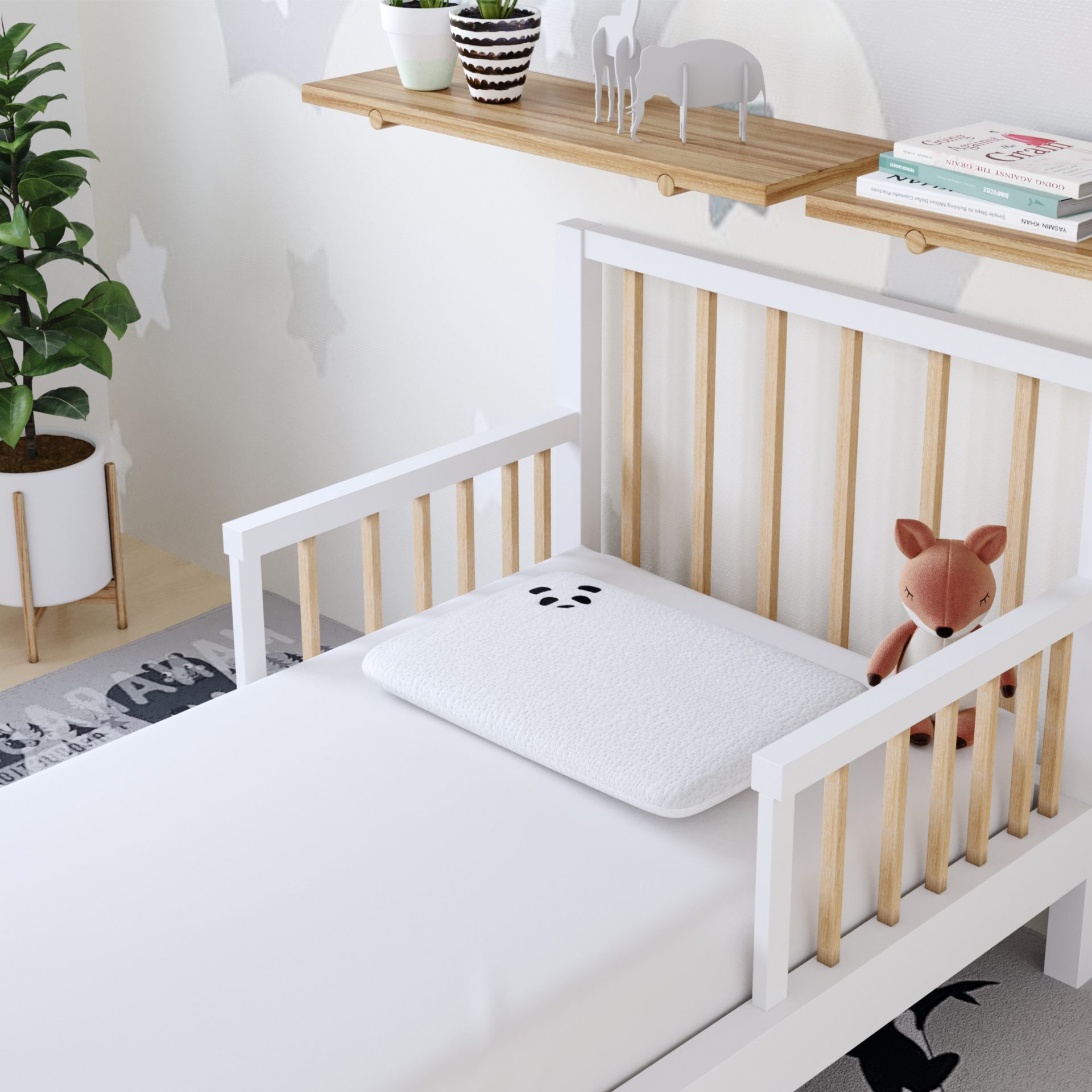 cot bed with panda pillow