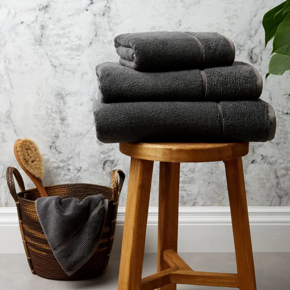 [BSUrbanGrey] Bath Sheet Bath Range Panda London Urban Grey Side View Grouped Towels on The Chair Lifestyle Image