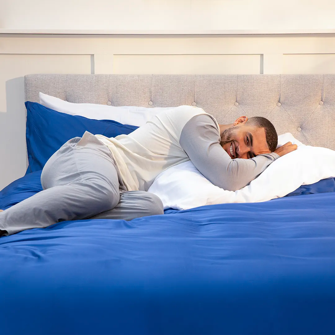 [BBNavyBlue] Deep Sea Navy Blue 100% Bamboo Bedding Set guy laying and smiling 