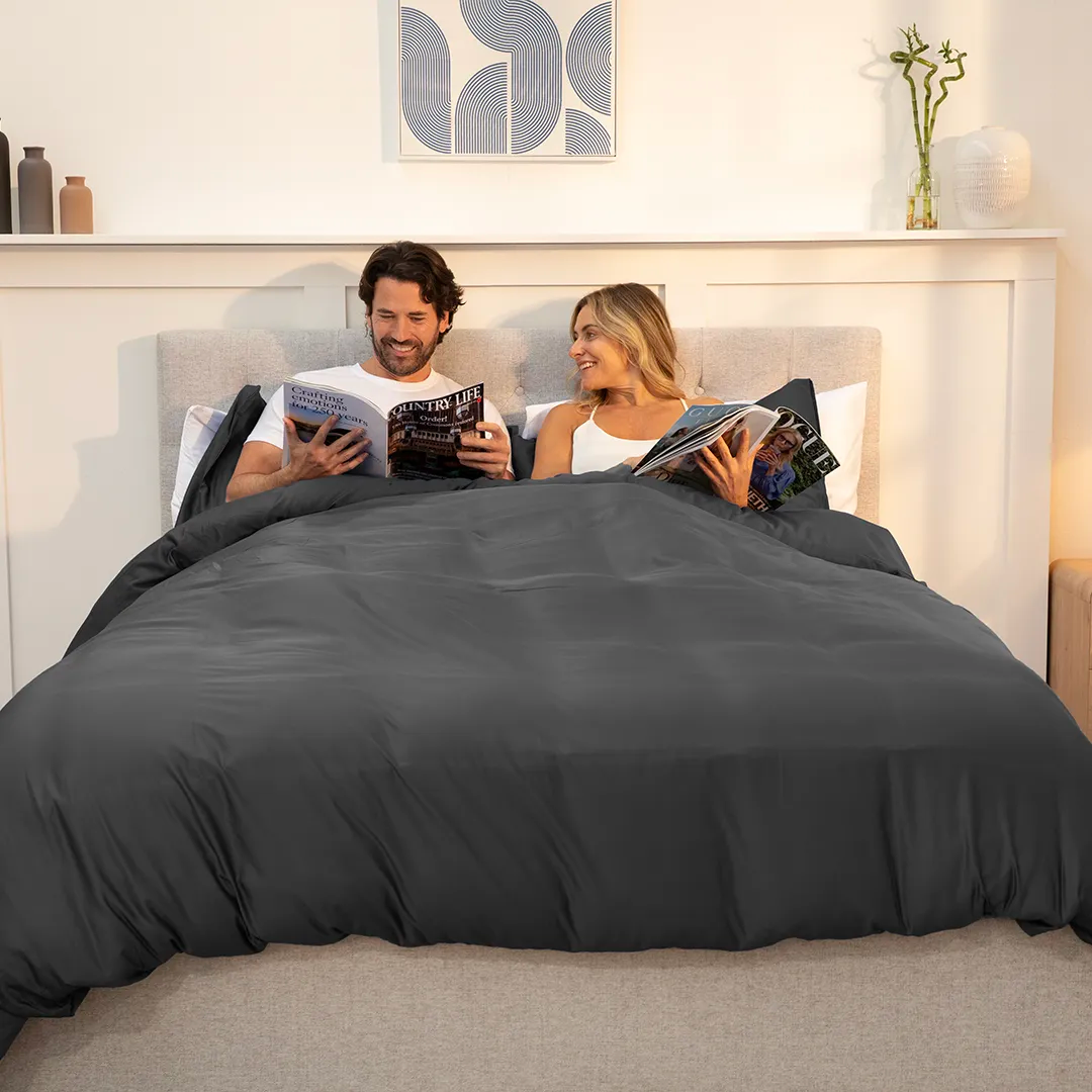 [BBUrbanGrey] 100_Bamboo_Bedding_Set_Urban_Grey_couple reading magazines