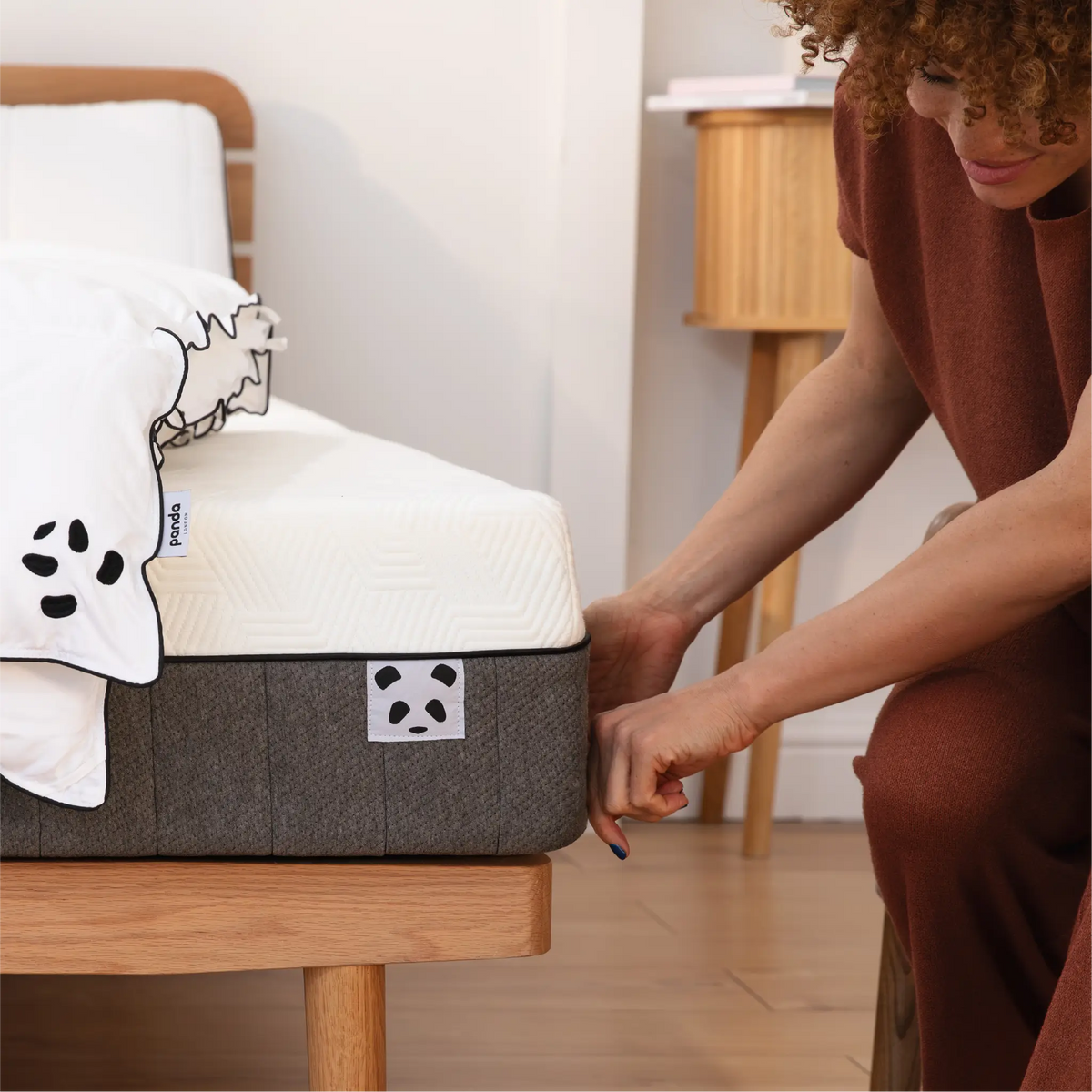 [HybridBambooMattressUpdated] Hybrid Bamboo Mattress Panda London Corner woman making the bed 