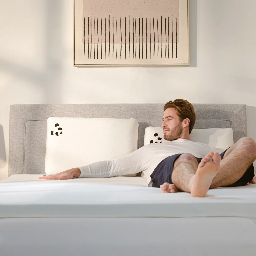 [MattressTopper] Guy laying on a Panda Bamboo Mattress Topper 