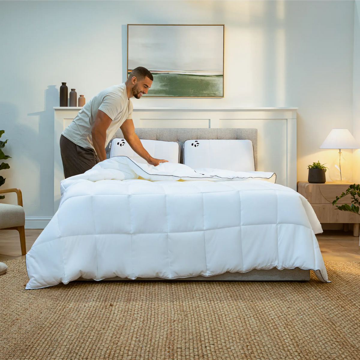 [CloudDuvet] Guy making the bed with Panda Cloud Duvet 10.5 TOG
