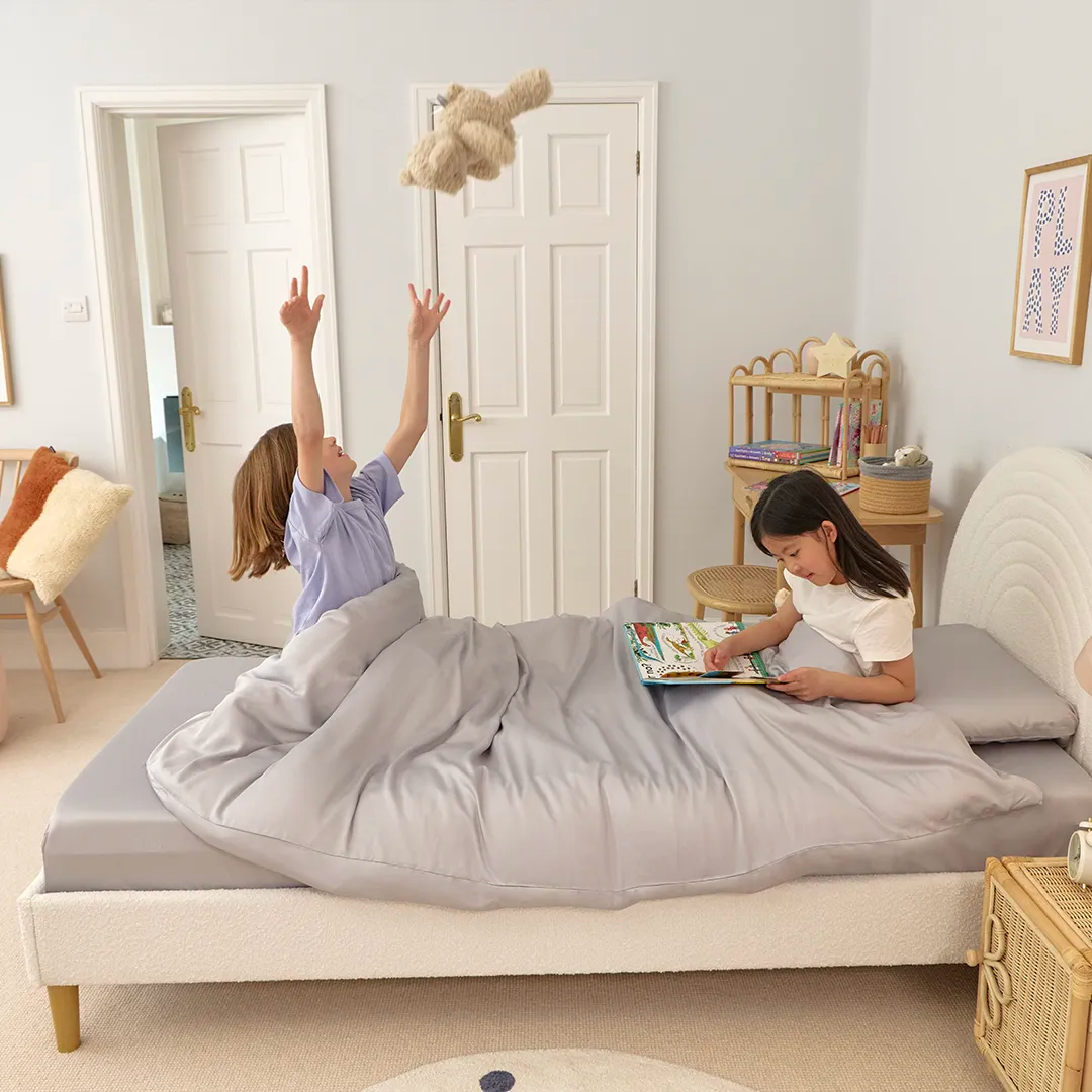 [FSKidsG] Girls playing on a Kids_Bamboo_Bedding_Set_Grey_3