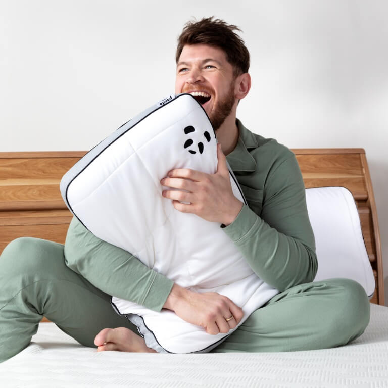 [UKSingleNavyCloudDuvetBundle] Guy Hugging Hybrid Bamboo Pillow and Smiling