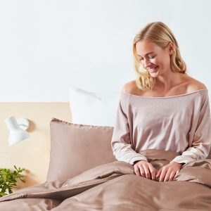 Woman In Bed With Panda London 100 Bamboo Bedding In Vintage Pink