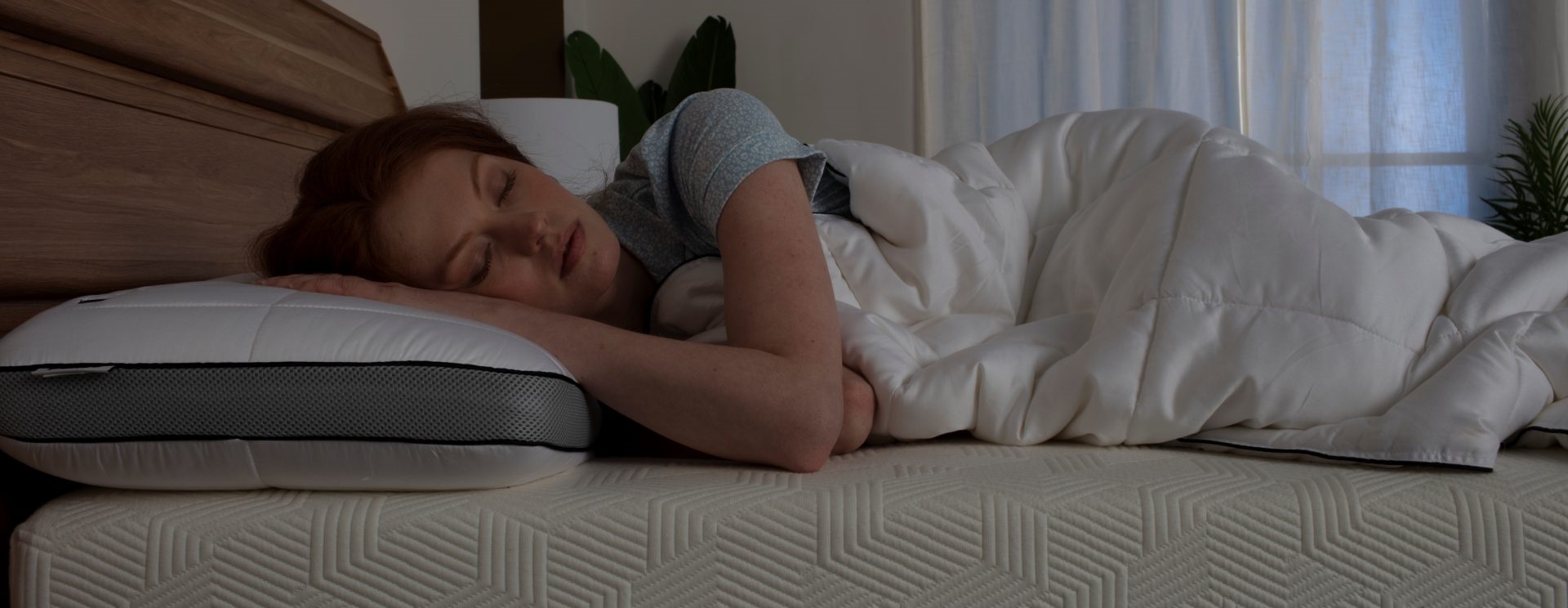 girl sleeping on a hybrid mattress