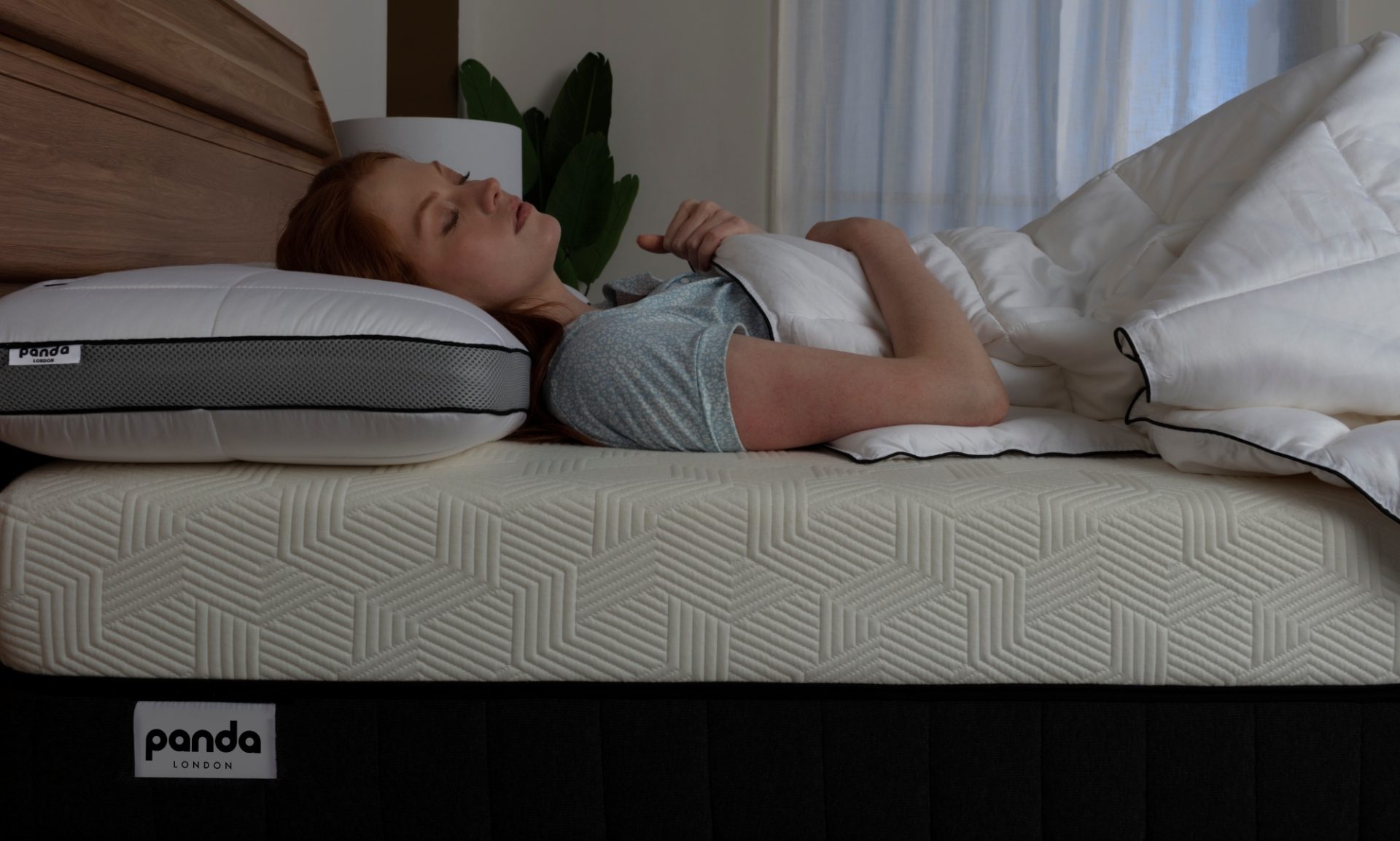girl sleeping on a hybrid mattress