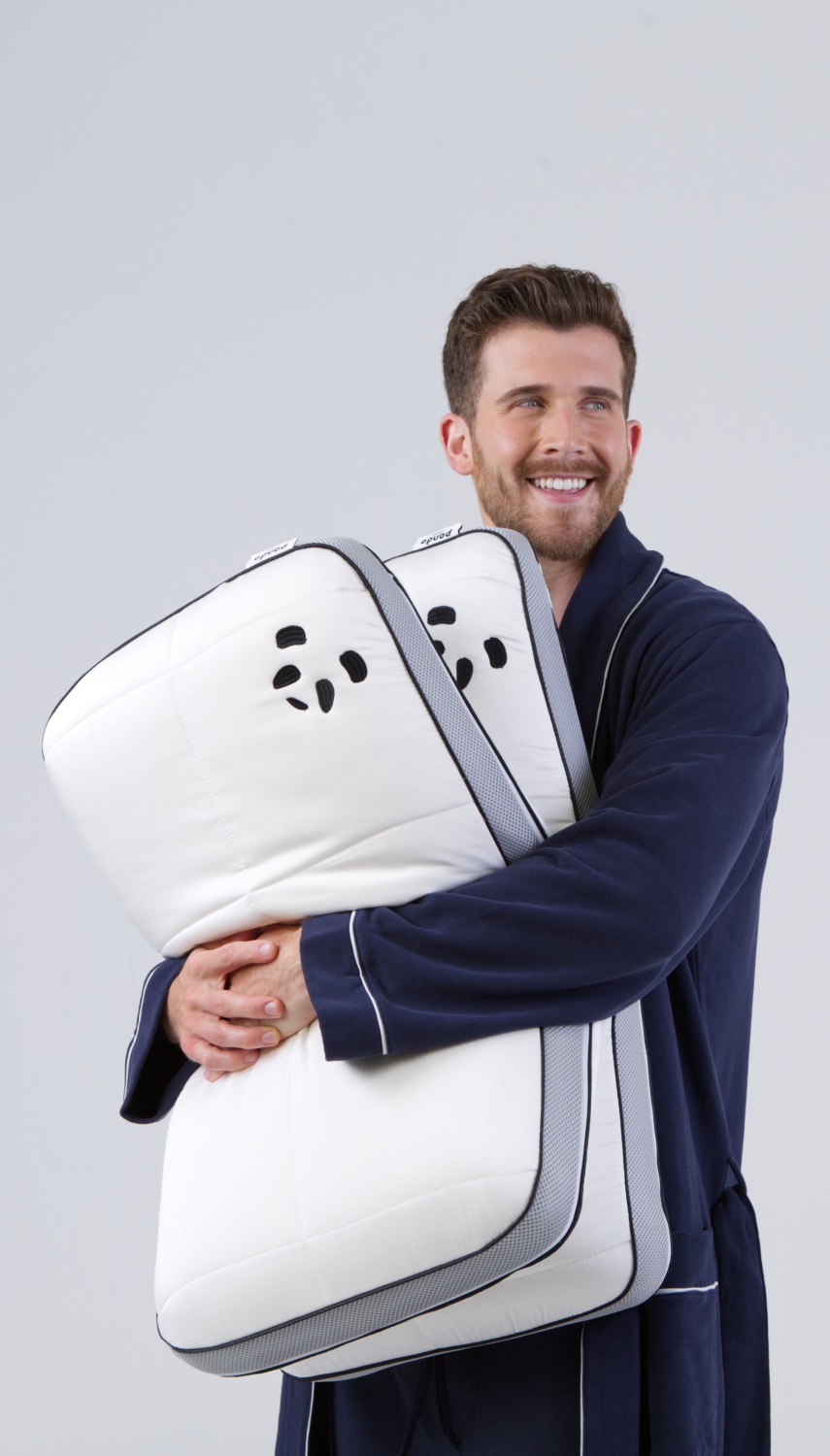 Hybrid Bamboo Pillow Guy holding lifestyle image